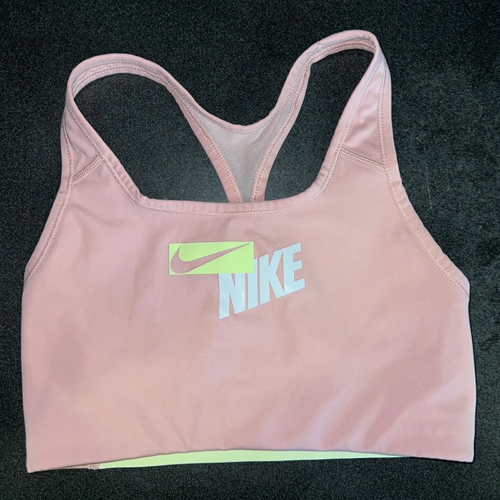 Pink and green Nike sports bra